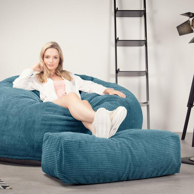 Lounge Pug, CloudSac 1010 XXL, Riesen Memory- Schaum XXL Sitzsacksofa, Schlafsofa, Pom-Pom Türkis